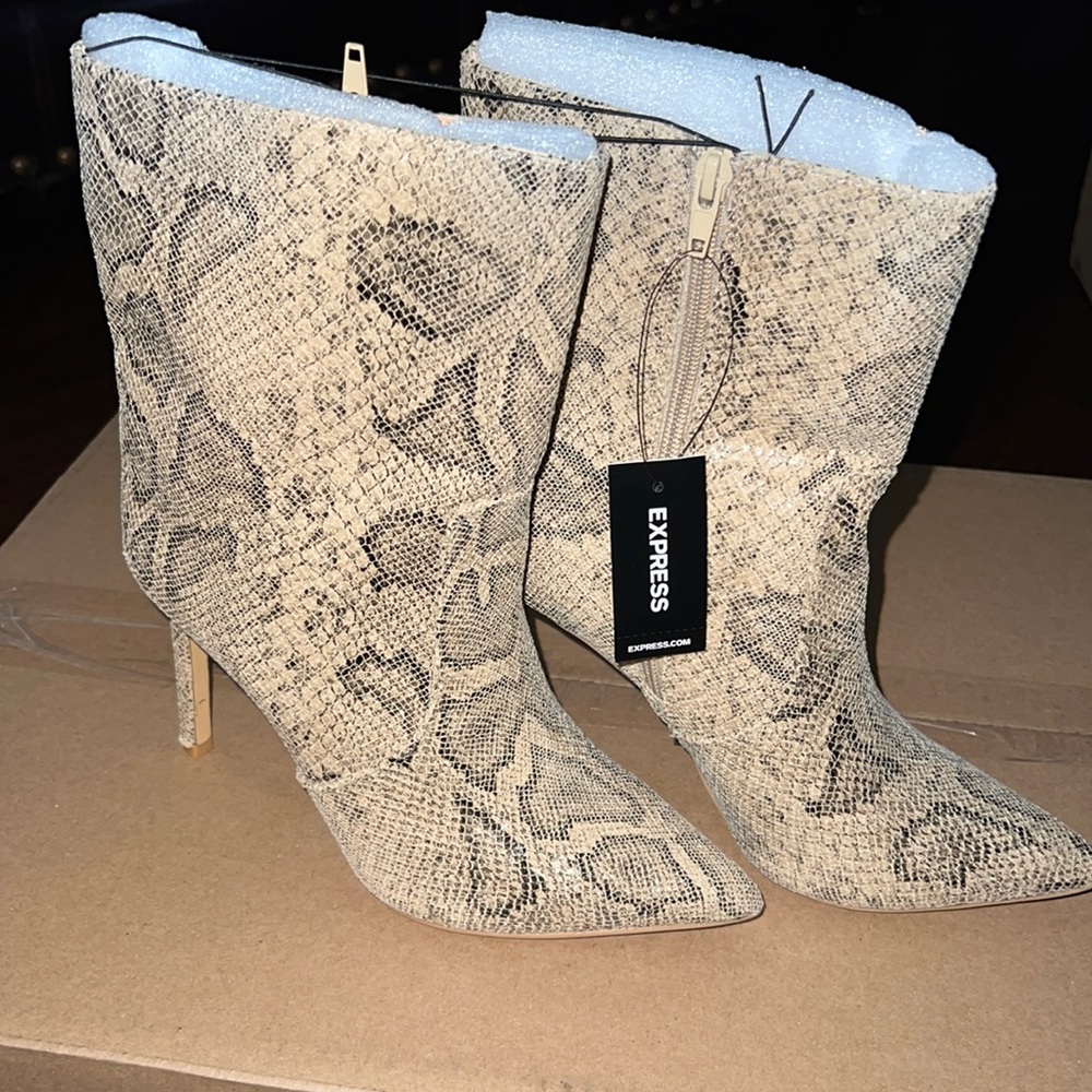 - Express woman’s heels boots